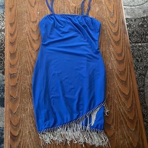Blue dress with cute sparkles on the end. Paid $30, and never worn